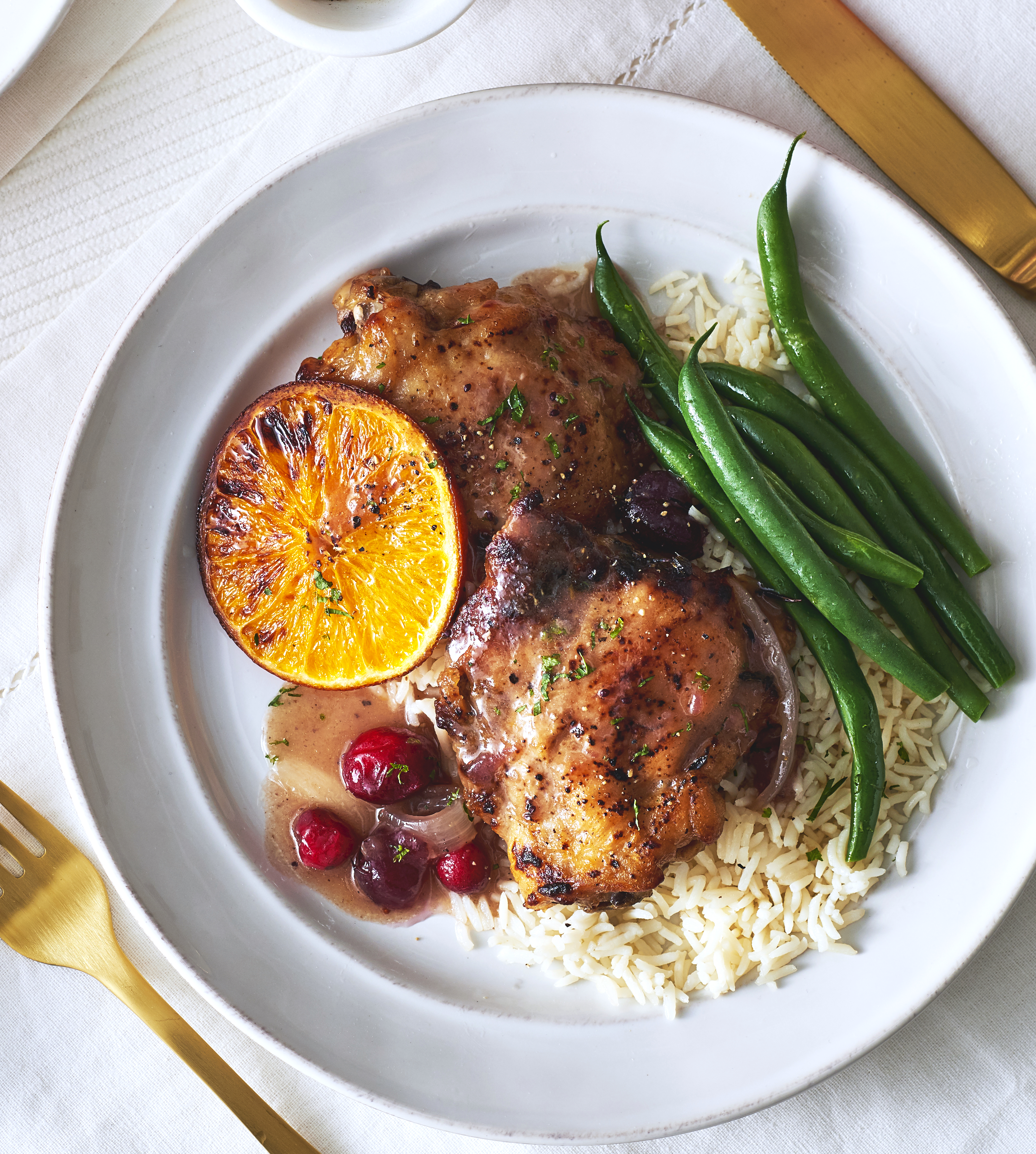 orange cranberry chicken thighs - recipe development and food styling by toronto recipe developer and food stylist, Annabelle Waugh